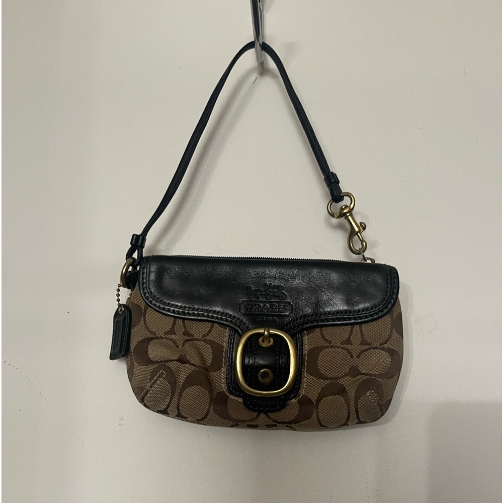 Used Coach clutch or wristlet